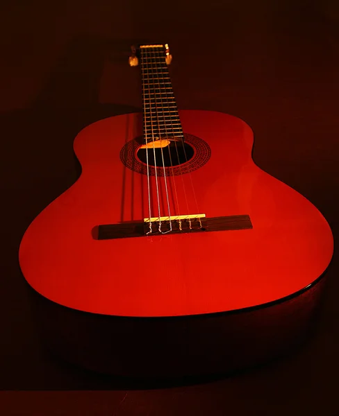 A red guitar in repose — Stock Photo, Image