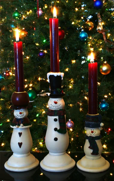 Un trío de velas de muñeco de nieve — Foto de Stock