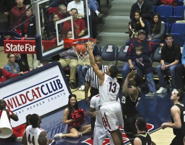 A Slam Dunk by Arizona Wildcat Nick Johnson clipart