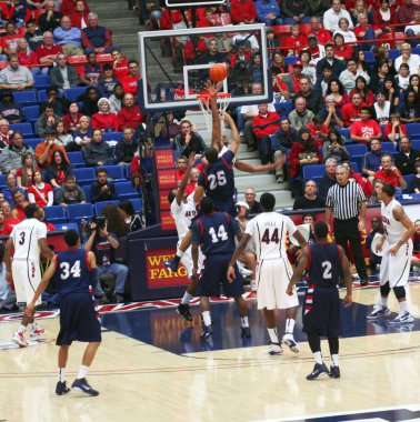 A Blocked Shot by Derrick Williams in an Arizona Basketball Game clipart