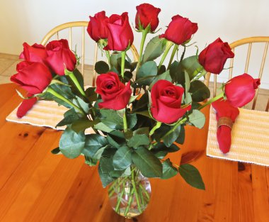 A Dozen Red Roses in a Crystal Vase clipart