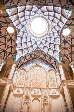 Beautiful decorated Dome of Khan-e Borujerdi historic house, Kashan, Iran clipart