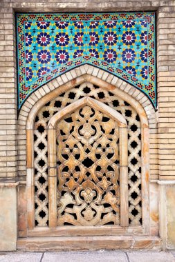 Mosaic wall and stone window of Golestan palace, Tehran clipart