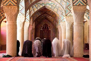 Muslim Friday pray in Prayer Hall of Nasir al-Molk Mosque clipart