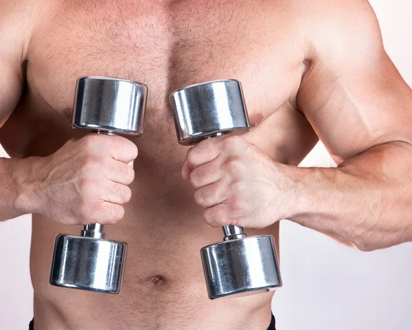 Man with a bar weights in hands training — Stock Photo, Image