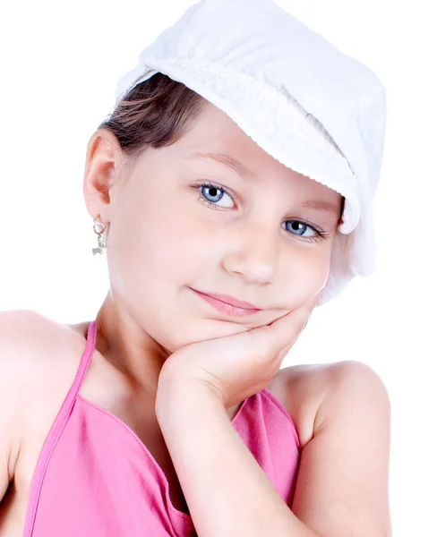 Cute little girl with white cap posing Stock Picture