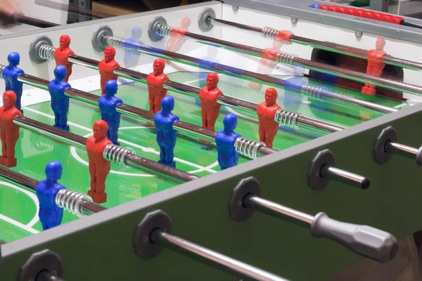 Foosball table game in action — Stock Photo, Image