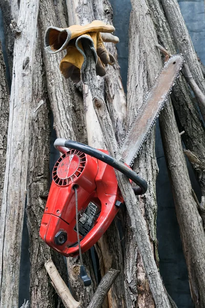 Gloves and Chainsaw — Stock Photo, Image