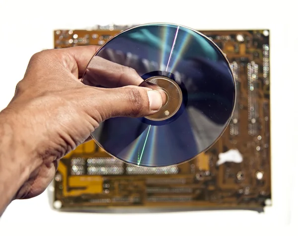 Озил держит компакт-диск — стоковое фото