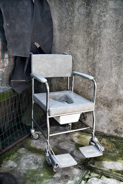 Solitary wheelchair — Stock Photo, Image