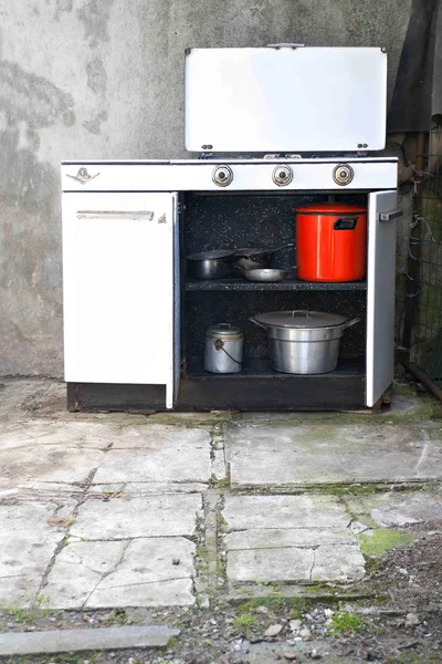 Cooker in a grunge interior — Stock Photo, Image