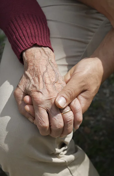 Young and old hands — Stock Photo, Image