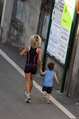 Mom and son running together clipart