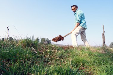 Gardener with shovel clipart