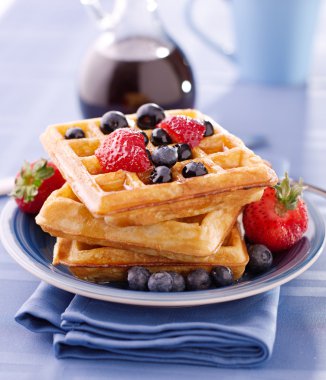 Blueberry waffles with strawberries clipart
