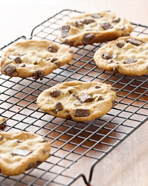 Cookies cooling on cooling rack clipart