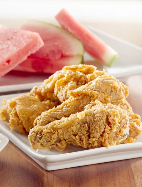 Fried chicken and watermelon — Stock Photo, Image