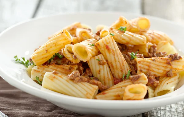 Rigatoni pasta with a tomato beef sauce — Stock Photo, Image