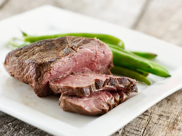 Sliced up rare steak — Stock Photo, Image