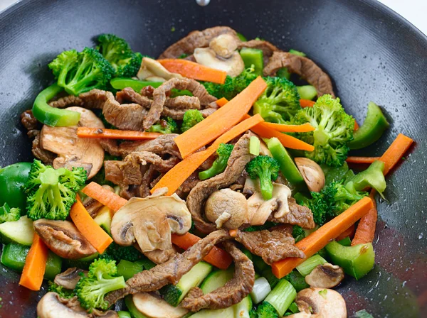 Overhead view of colorful stirfry Royalty Free Stock Photos