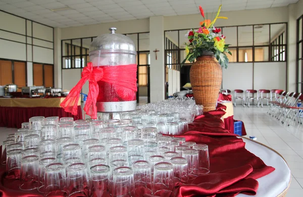 Stock image Regular glasses on the table with flowers