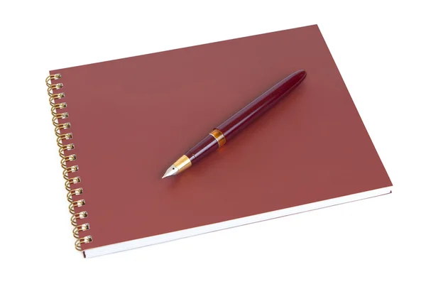 Спіральний блокнот і ручка — стокове фото