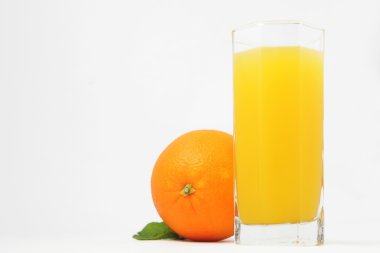 Glass of juice and orange