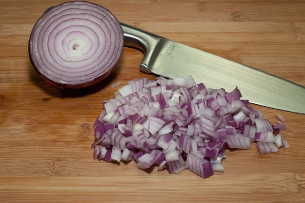 stock image Chopped Onions on Bamboo Cutting board