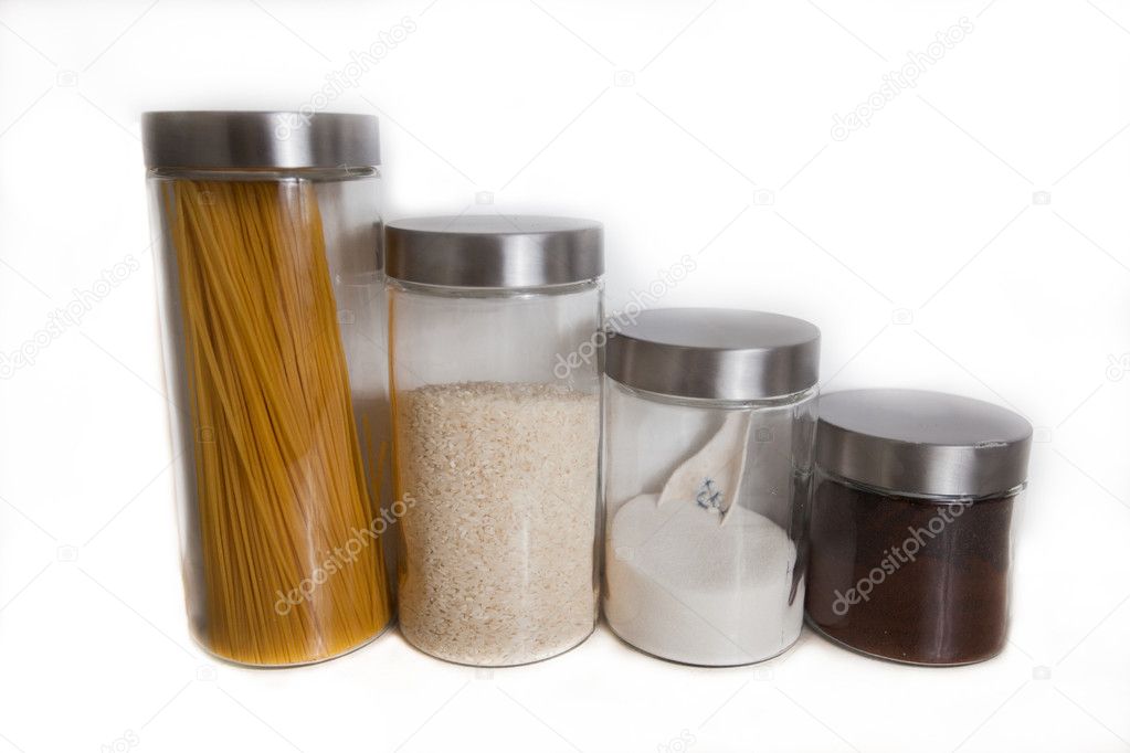 Glass Jars Containing Dry Foods isolated on White