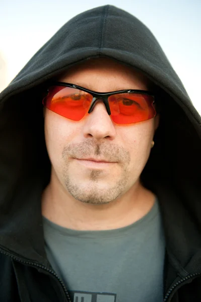 stock image Portrait of the rapper in the red glasses