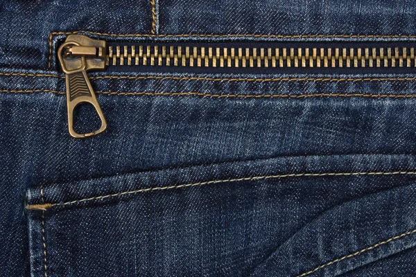 Closeup of zipper in blue jeans — Stock Photo, Image