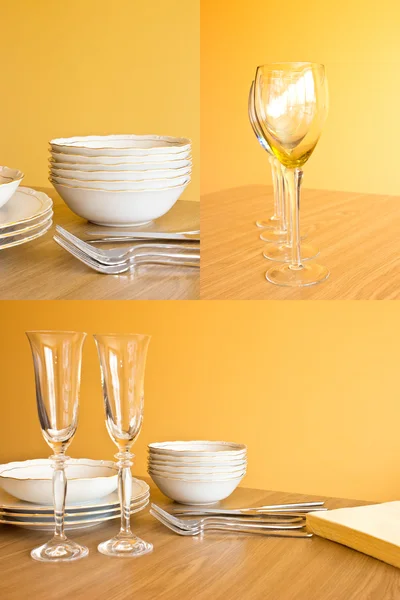 Sauberes Geschirr auf Holztisch auf orangefarbenem Hintergrund — Stockfoto