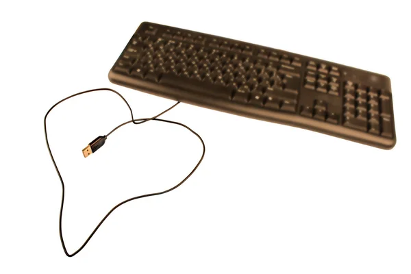 Klavye, bir kalp olarak kablo — Stok fotoğraf