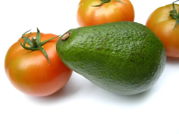 Avocado with tomatoes — Stock Photo, Image