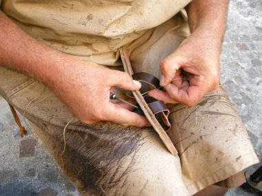 Shoemaker at work clipart