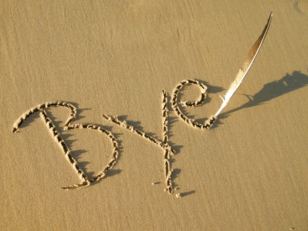Bye written in sand — Stock Photo, Image