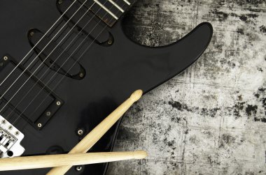 Electric guitar on a grunge background clipart