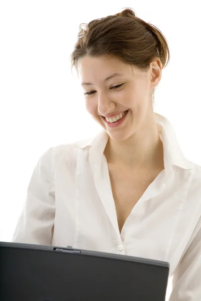 Aantrekkelijke jonge vrouw met laptop op de witte — Stockfoto