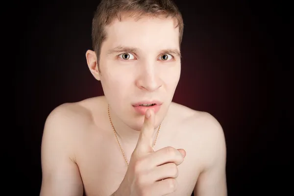 人在做一个沉默姿态用他的食指 — 图库照片