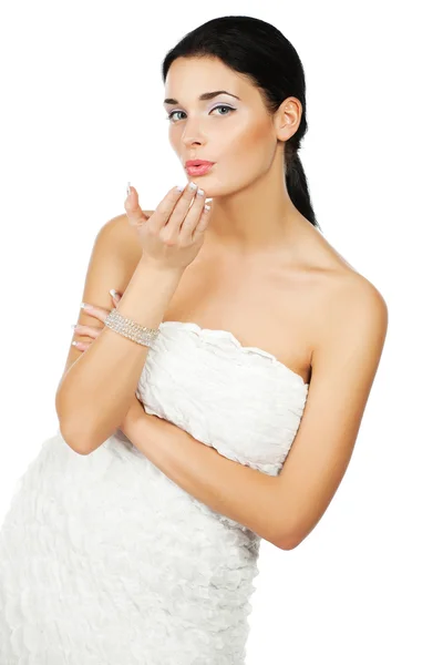 Slim beautiful woman with long hair wearing luxurious wedding dress — Stock Photo, Image