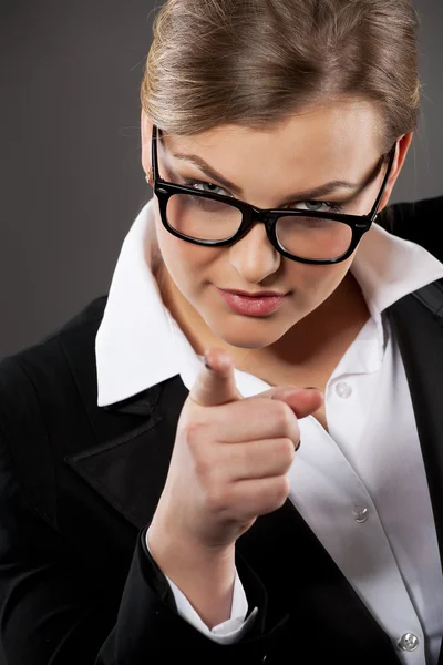 A young beautiful business woman pointing at the camera — Stock Photo, Image