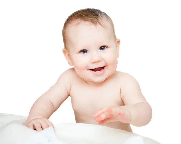 Krásný usměvavý miminko zabalená do deky — Stock fotografie
