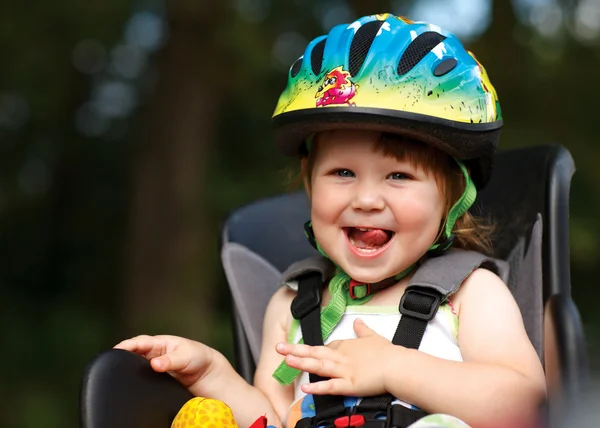 Little girl in the seat bicycle — Stock Photo, Image