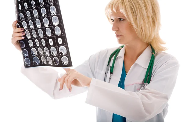 Female doctor looking at a tomogram — Stock Photo, Image