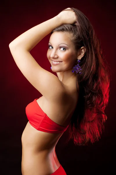 Sexy Blondine in Dessous über rotem Hintergrund — Stockfoto