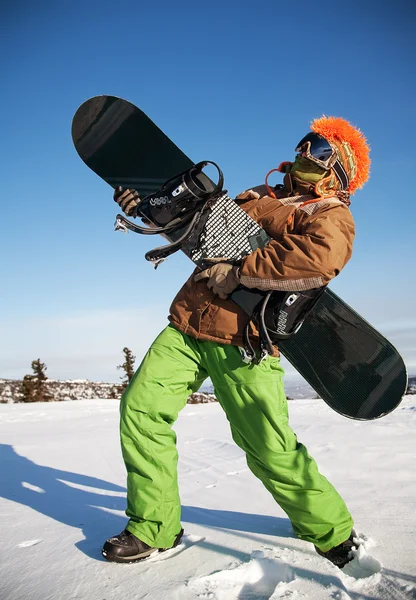 Portret van een man met de snowboard — Stockfoto