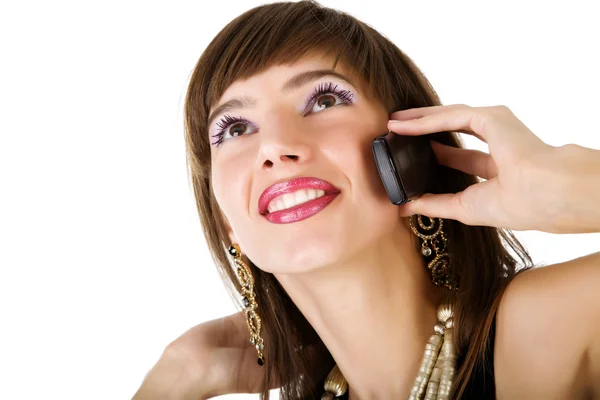 Junge lächelnde Frau telefoniert. über weißem Hintergrund — Stockfoto