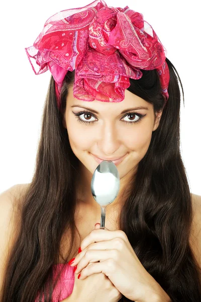 Mulher muito smilimg segurando um sppon — Fotografia de Stock