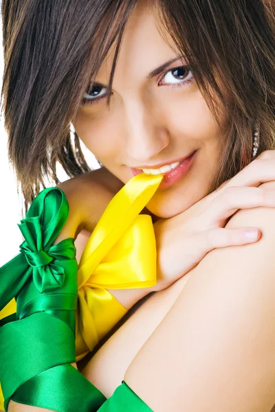 Bright picture of young woman with ribbon isolated — Stock Photo, Image