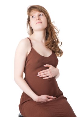 Caucasian woman pregnant on white background clipart